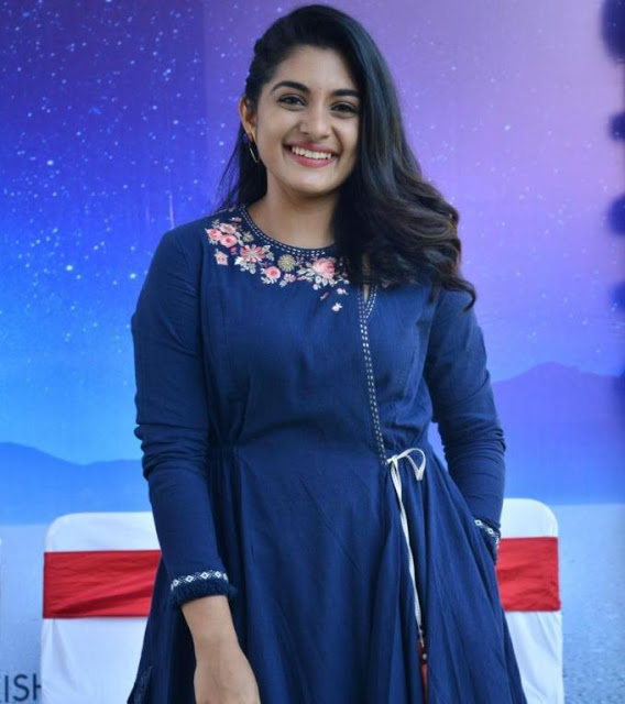 Nivetha Thomas Stills In Blue Dress At Tamil Movie Opening 16